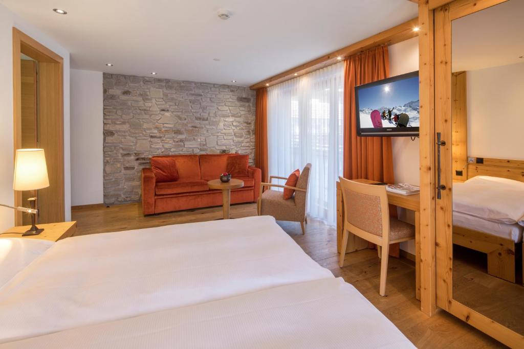 Postel nebo postele na pokoji v ubytování Hotel Phoenix