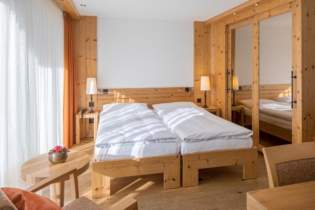 Postel nebo postele na pokoji v ubytování Hotel Phoenix