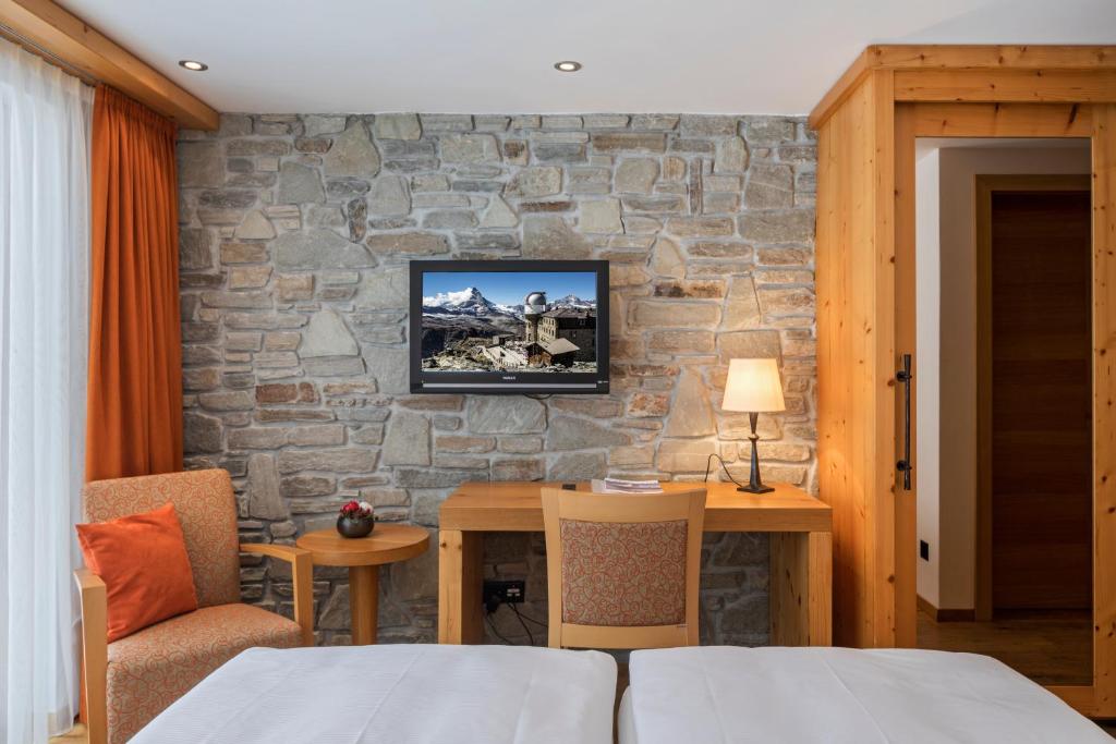 TV a/nebo společenská místnost v ubytování Hotel Phoenix