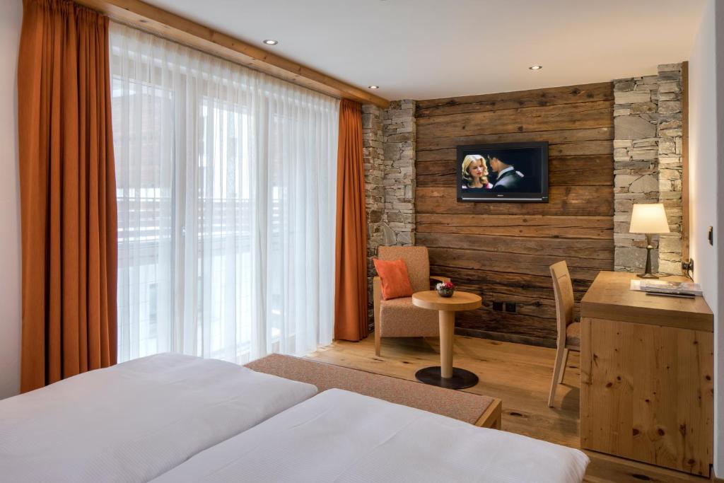 TV a/nebo společenská místnost v ubytování Hotel Phoenix