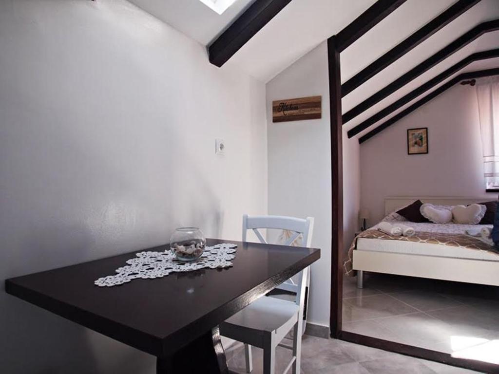 Postel nebo postele na pokoji v ubytování Rooms & Studio Stipcic
