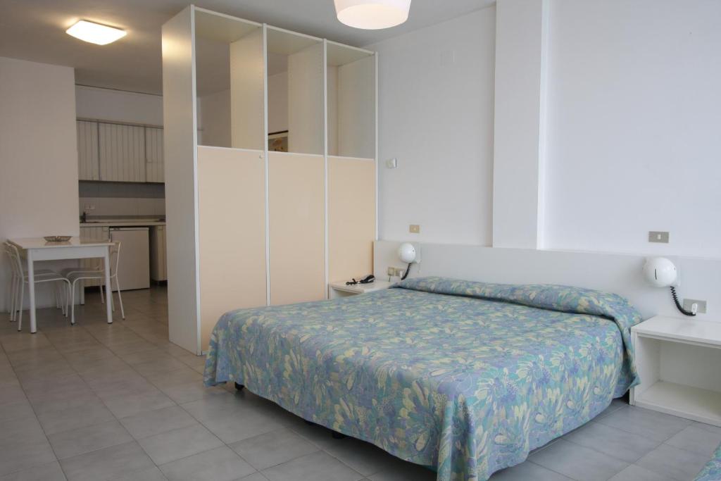 Postel nebo postele na pokoji v ubytování Grand Hotel Golf