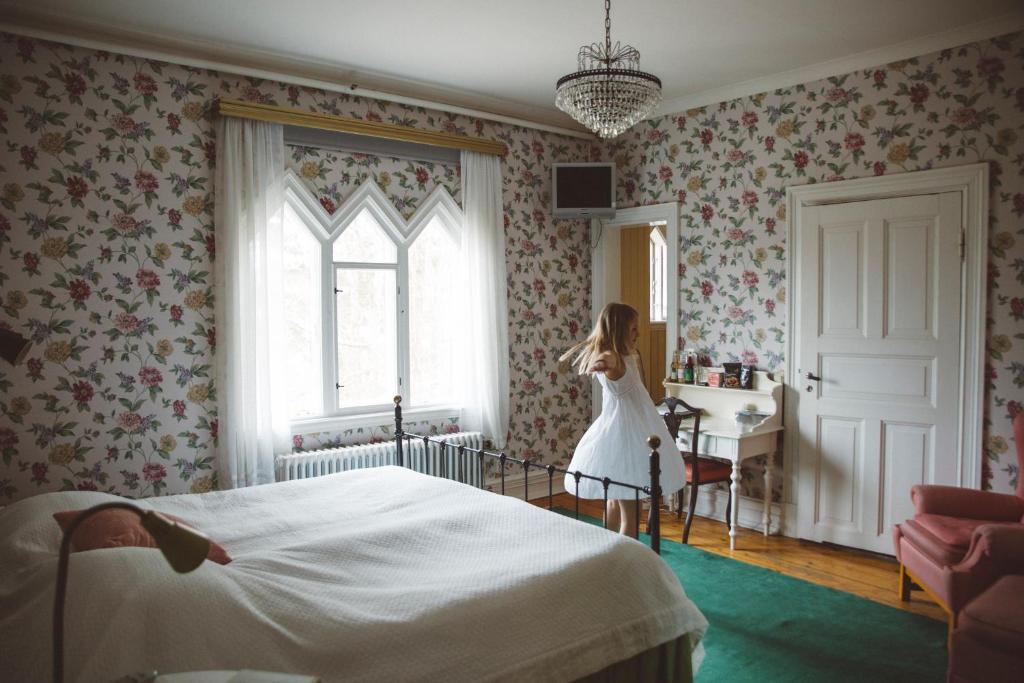 Postel nebo postele na pokoji v ubytování Villa Sjötorp