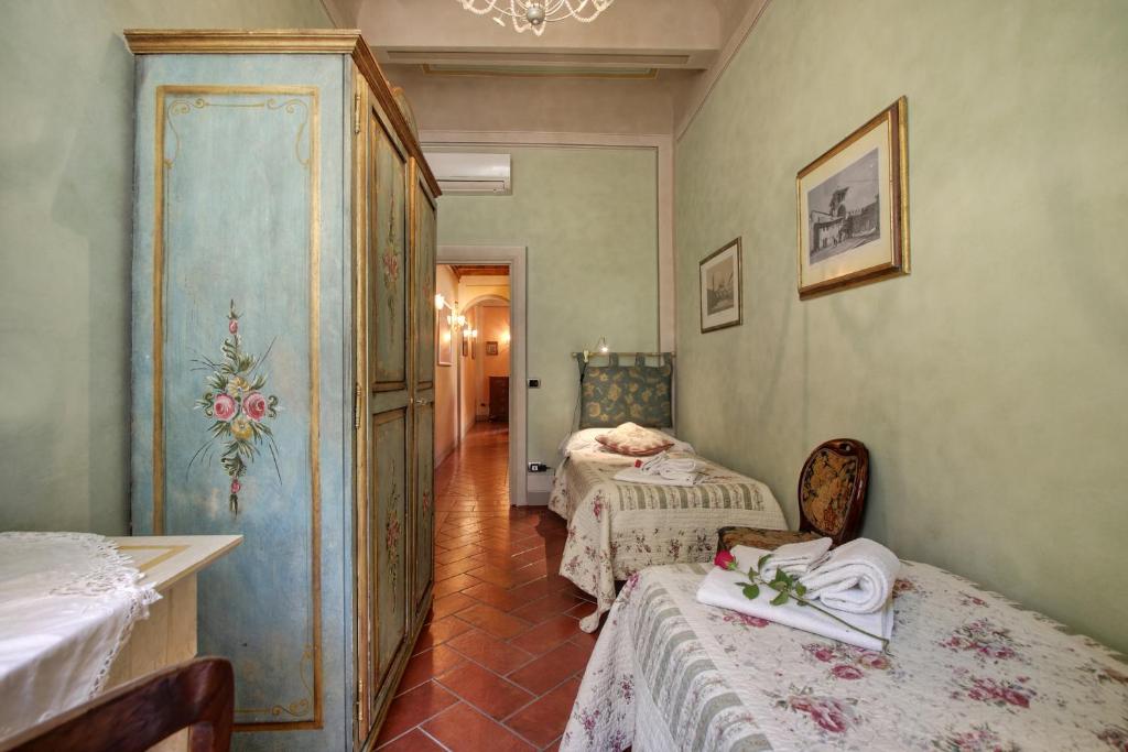 Łóżko lub łóżka w pokoju w obiekcie Pergola Apartment