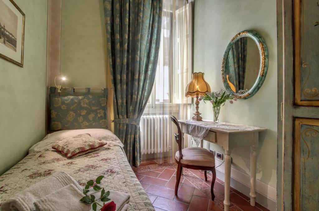 Łóżko lub łóżka w pokoju w obiekcie Pergola Apartment