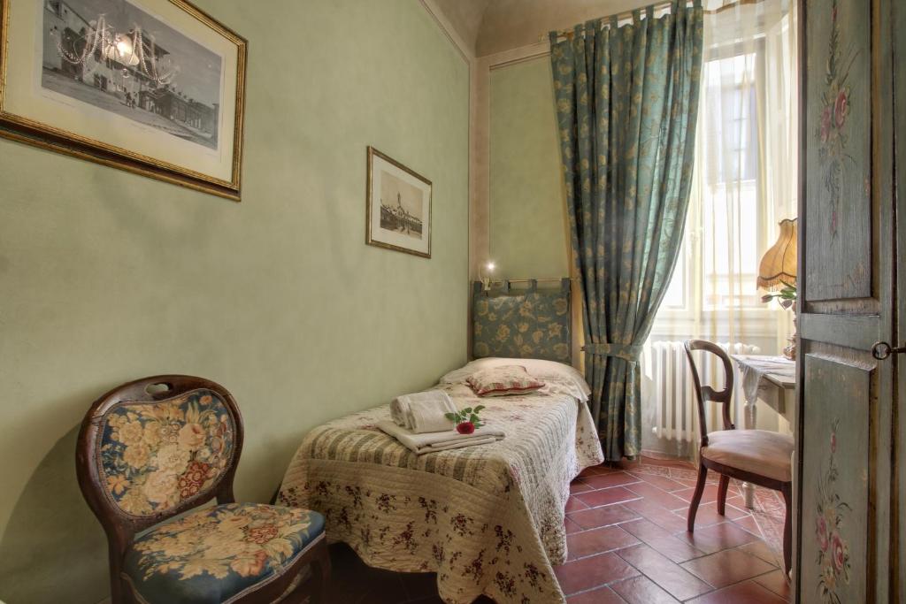 Łóżko lub łóżka w pokoju w obiekcie Pergola Apartment