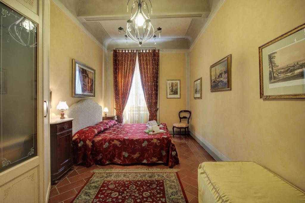 Łóżko lub łóżka w pokoju w obiekcie Pergola Apartment