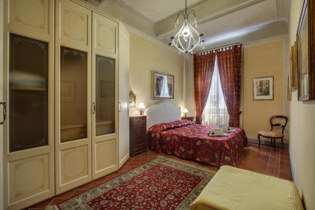 Łóżko lub łóżka w pokoju w obiekcie Pergola Apartment
