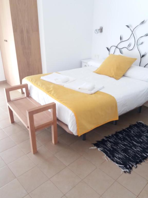 Postel nebo postele na pokoji v ubytování Hostal Aquaforum