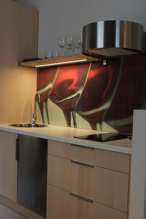 Kuchyň nebo kuchyňský kout v ubytování Apartments42
