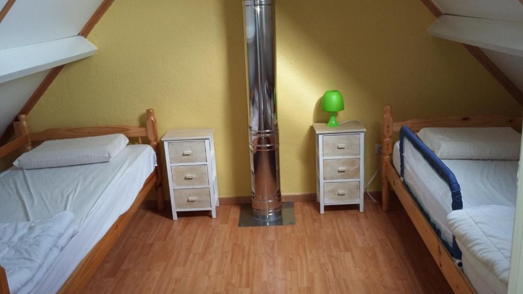 Postel nebo postele na pokoji v ubytování Duinenhof