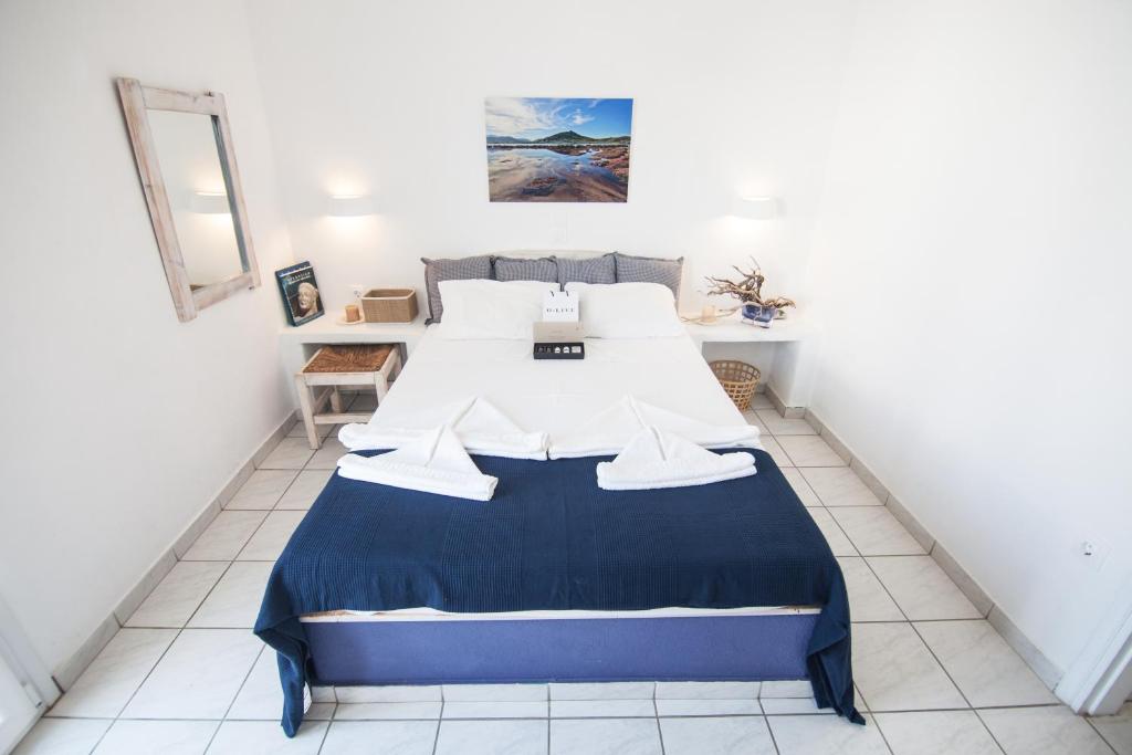 Postel nebo postele na pokoji v ubytování Alea Apartments
