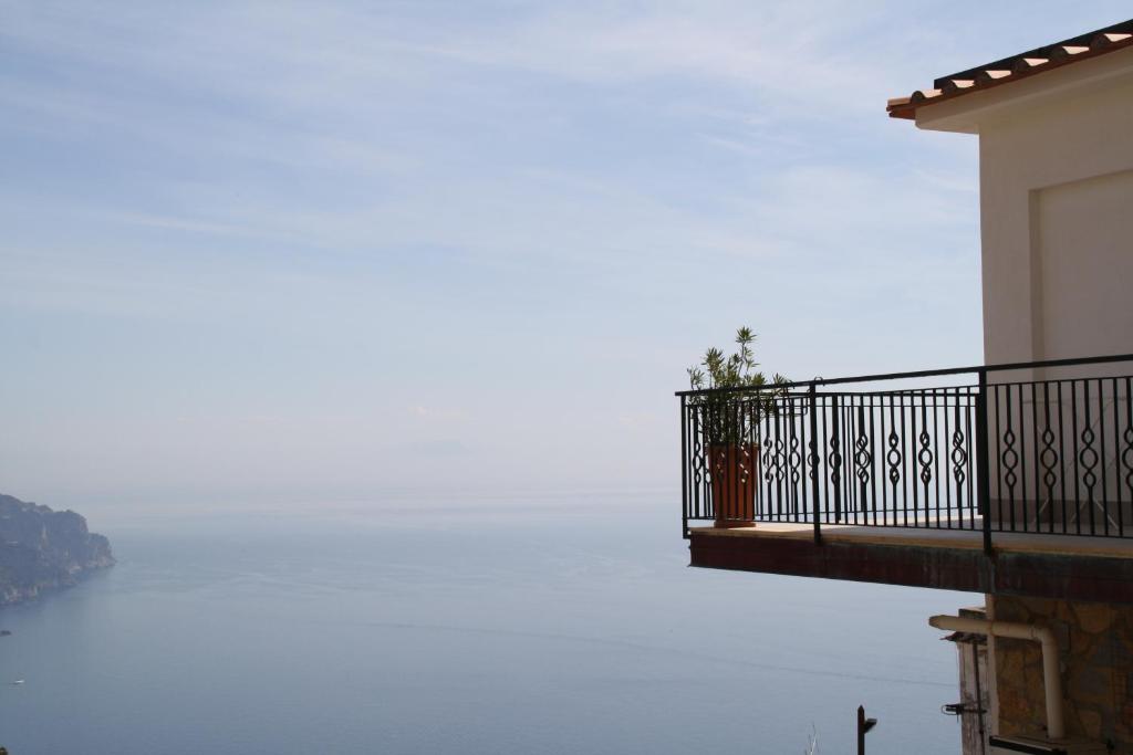a view of the water from a balcony of a building at Residenza Sveva in Ravello