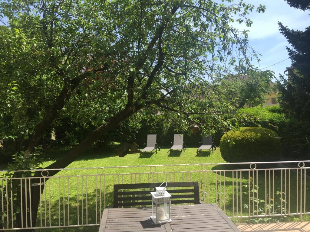 a table with a lantern sitting on top of it at Appartement Orana in Oberhausbergen