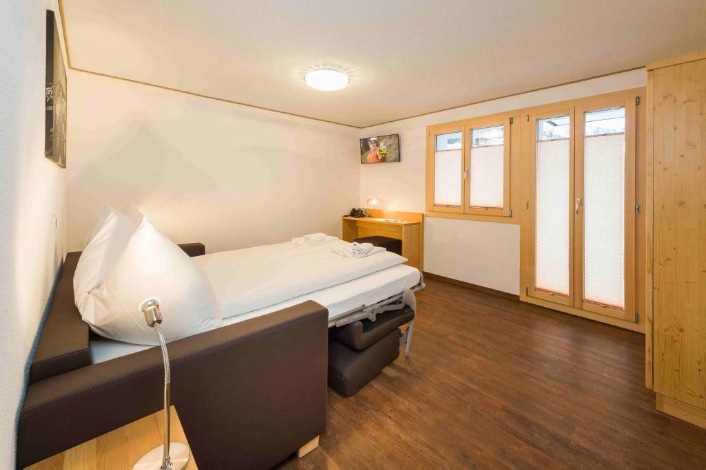 Postel nebo postele na pokoji v ubytování B&B AZapartments Lunic