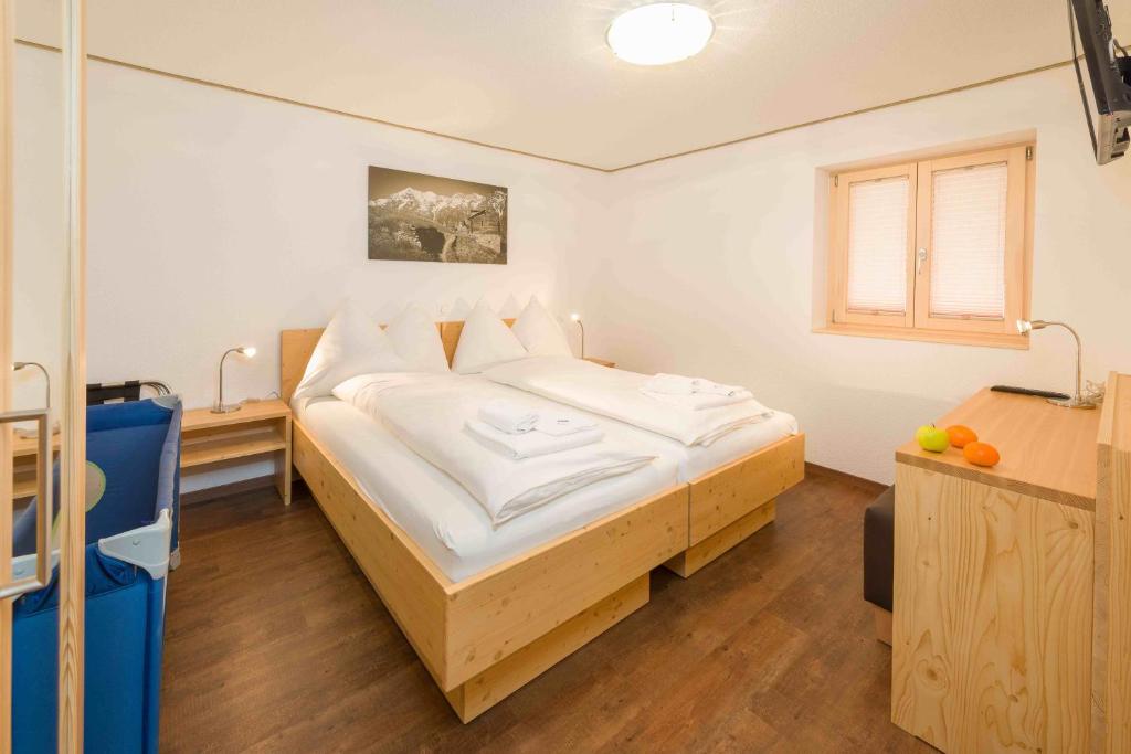 Postel nebo postele na pokoji v ubytování B&B AZapartments Lunic