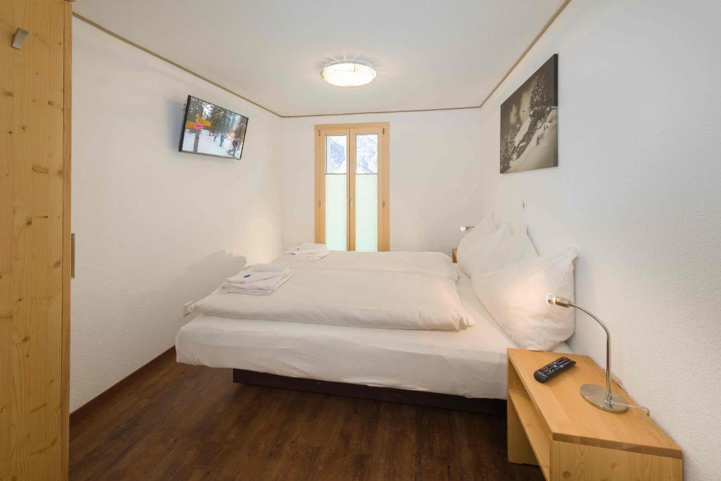 Postel nebo postele na pokoji v ubytování B&B AZapartments Lunic