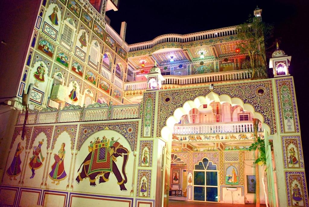 a building with an elephant painted on the side of it at Hotel Shekhawati, A boutique stay in Mandāwa