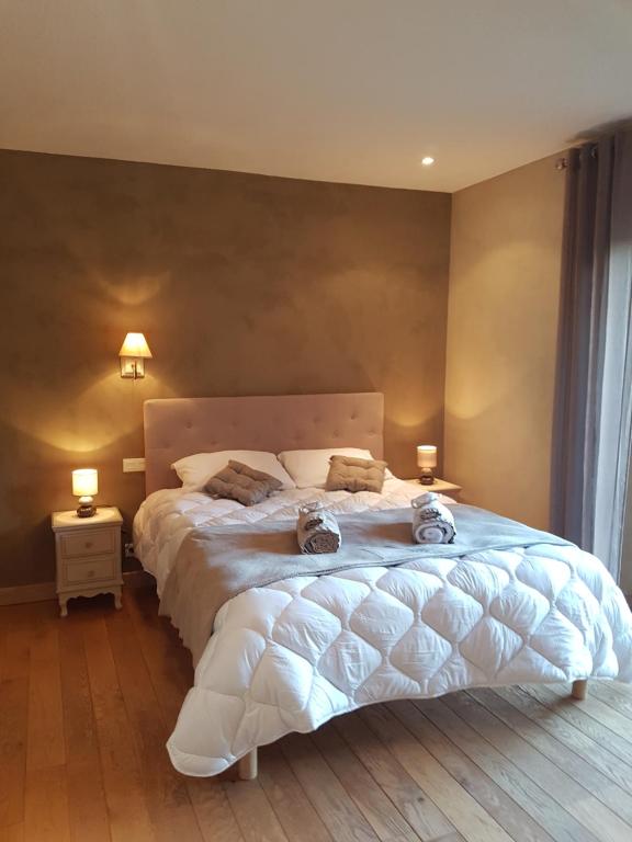 Postel nebo postele na pokoji v ubytování B&B Lou Mas
