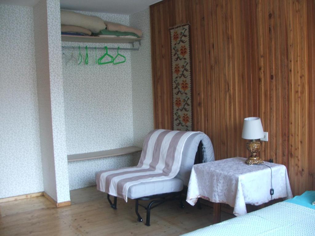 Postel nebo postele na pokoji v ubytování Uroczy Domek Z Ogrodem I Tarasem