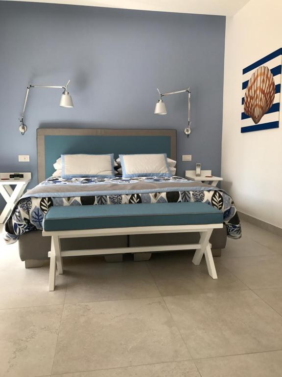 Postel nebo postele na pokoji v ubytování Al Parco Primavera B&B