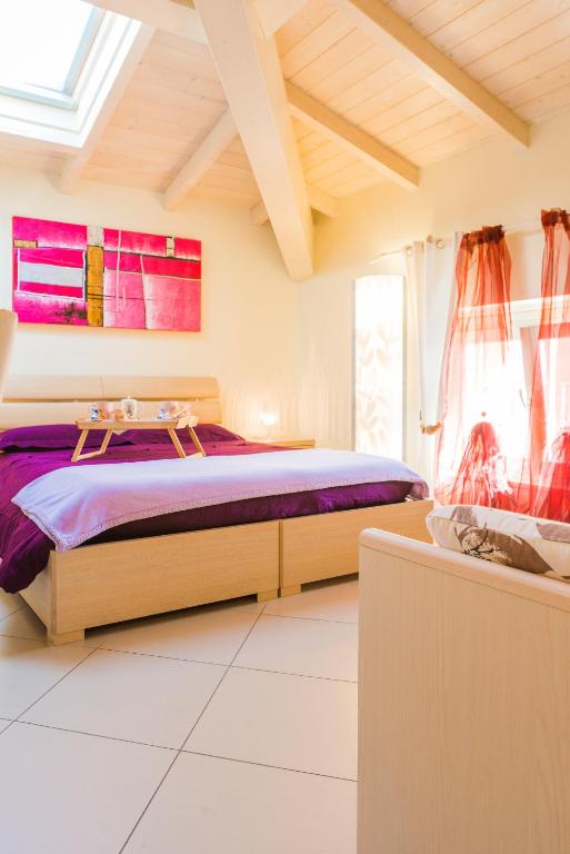 Postel nebo postele na pokoji v ubytování Relais Il Nido