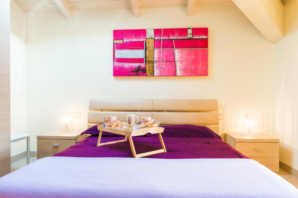 Postel nebo postele na pokoji v ubytování Relais Il Nido