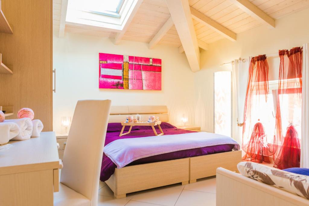 Postel nebo postele na pokoji v ubytování Relais Il Nido