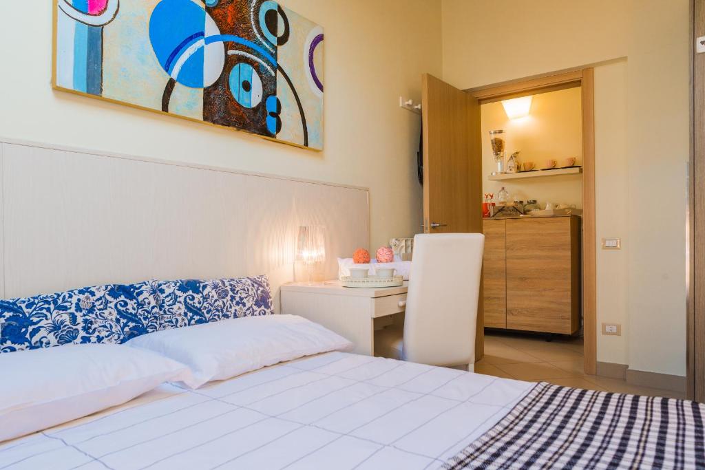 Postel nebo postele na pokoji v ubytování Relais Il Nido