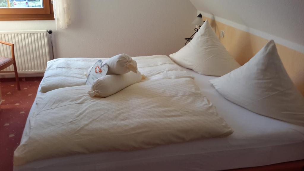 Postel nebo postele na pokoji v ubytování Hotel Birkenhof Garni