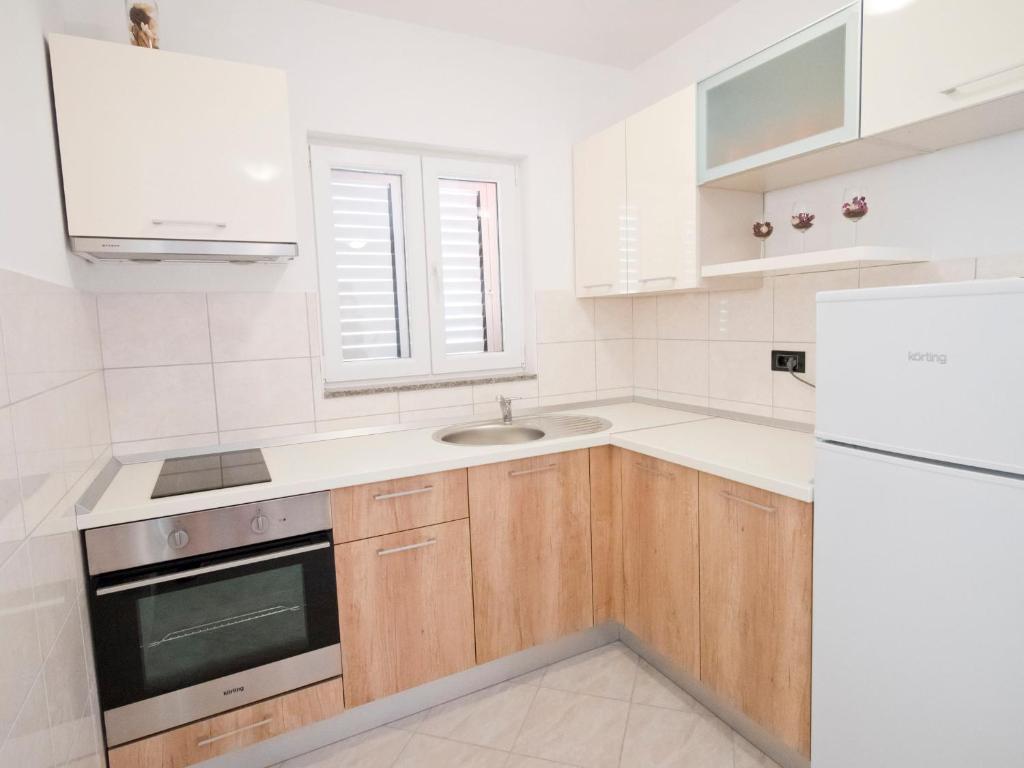 Kuchyň nebo kuchyňský kout v ubytování Apartment Bamba