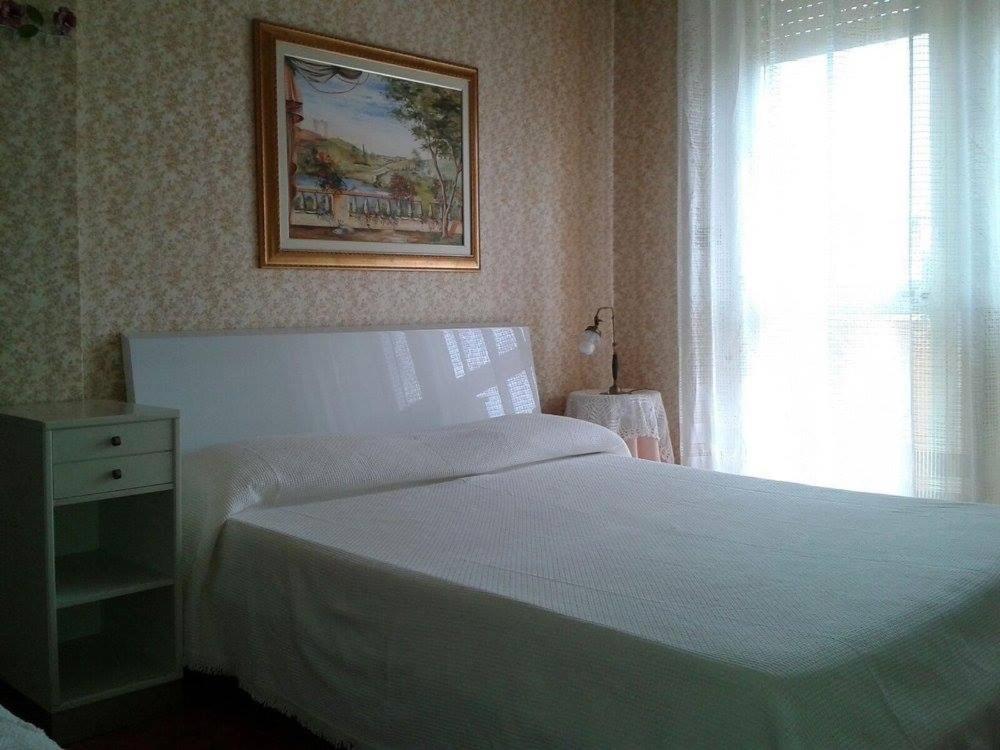 Postel nebo postele na pokoji v ubytování B&B Dai Nonni