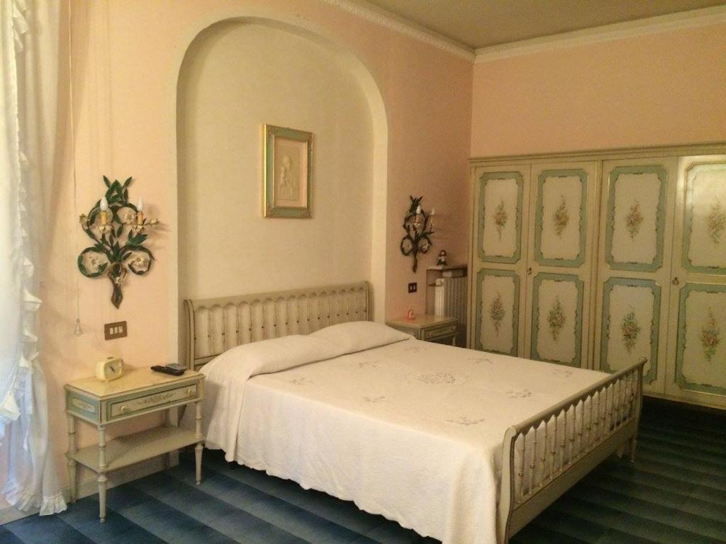 Postel nebo postele na pokoji v ubytování B&B Dai Nonni