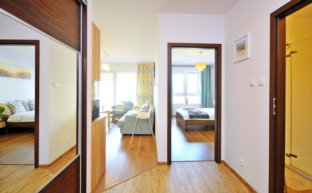 Posteľ alebo postele v izbe v ubytovaní ApartamentyPrzyMorzu Solna 201 - W centrum blisko morza