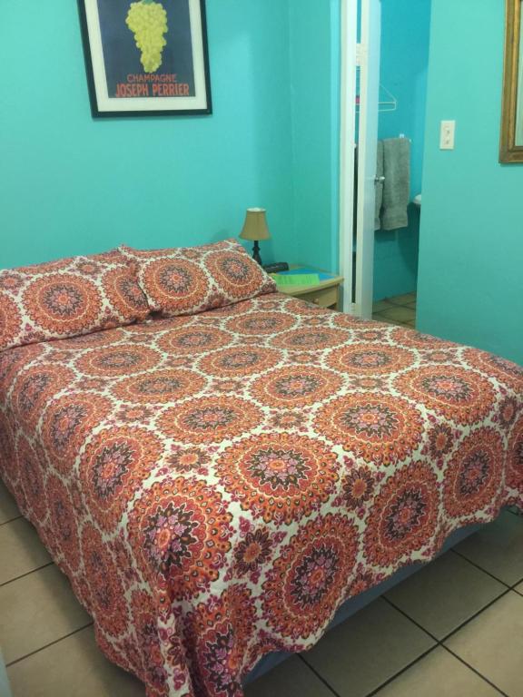 Postel nebo postele na pokoji v ubytování Palmetto Guesthouse