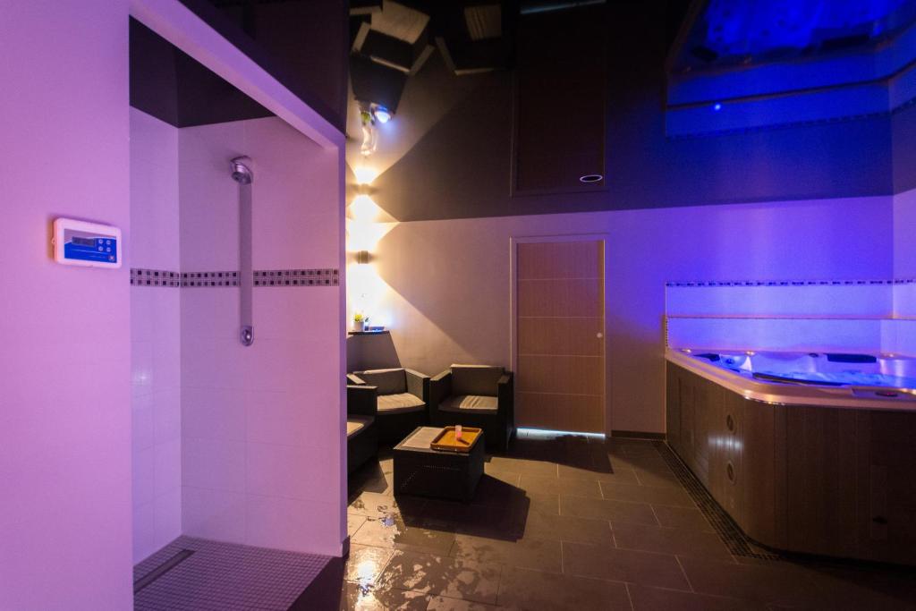 TV a/nebo společenská místnost v ubytování Mon Cocoon Spa
