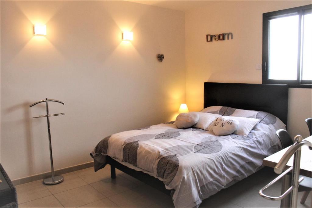 Postel nebo postele na pokoji v ubytování Mon Cocoon Spa