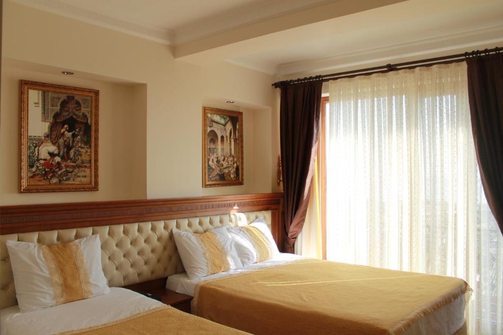 Postel nebo postele na pokoji v ubytování Blue Istanbul Hotel