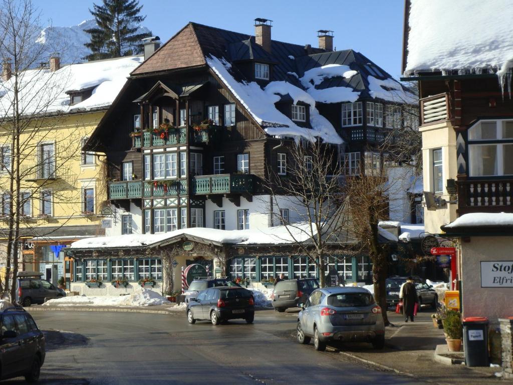 a large building with snow on the roof at Villa Salis in Altaussee