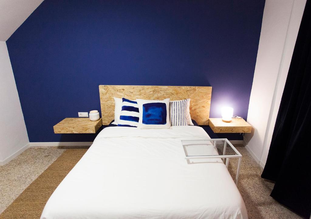 Posteľ alebo postele v izbe v ubytovaní B&B El Mercat