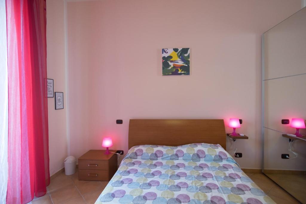 Postel nebo postele na pokoji v ubytování Bed and breakfast MieleZenzero