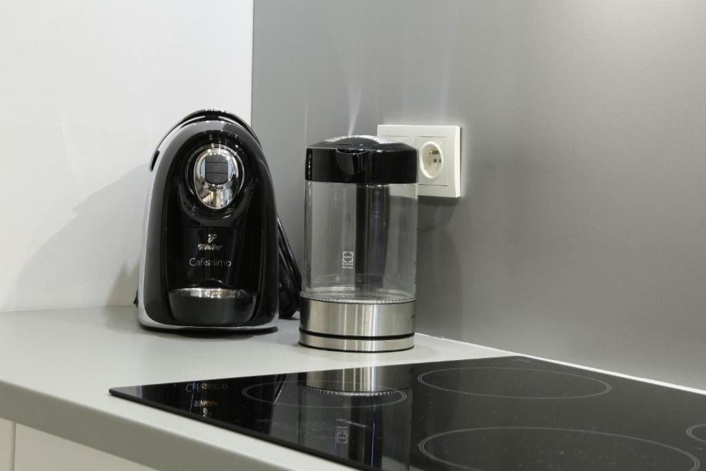 Príslušenstvo na prípravu kávy alebo čaju v ubytovaní Apartament Tatrzanski Raj