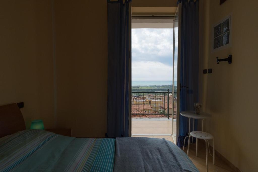 Postel nebo postele na pokoji v ubytování Bed and breakfast MieleZenzero