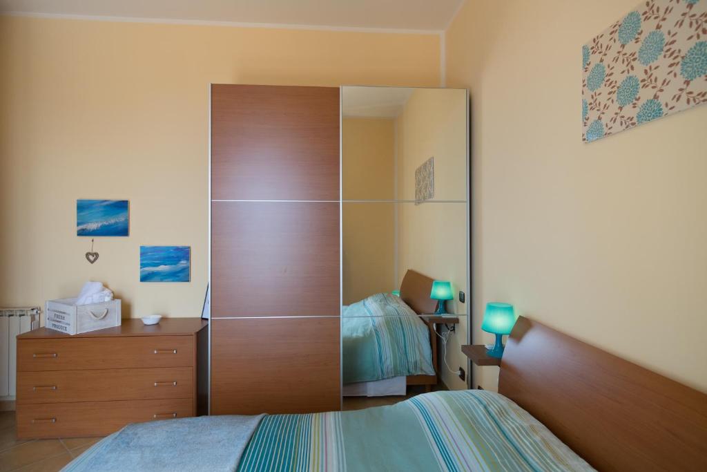 Postel nebo postele na pokoji v ubytování Bed and breakfast MieleZenzero
