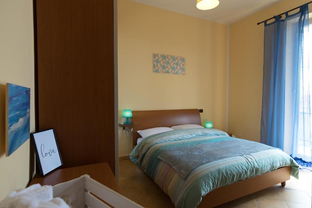 Postel nebo postele na pokoji v ubytování Bed and breakfast MieleZenzero