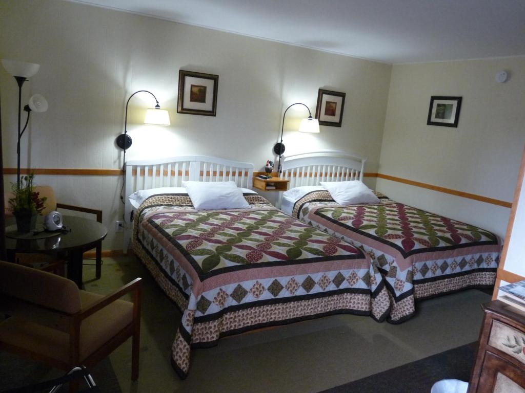 Krevet ili kreveti u jedinici u objektu Country Villa Motel