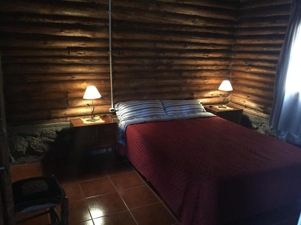 Voodi või voodid majutusasutuse Cabañas Sehuen toas