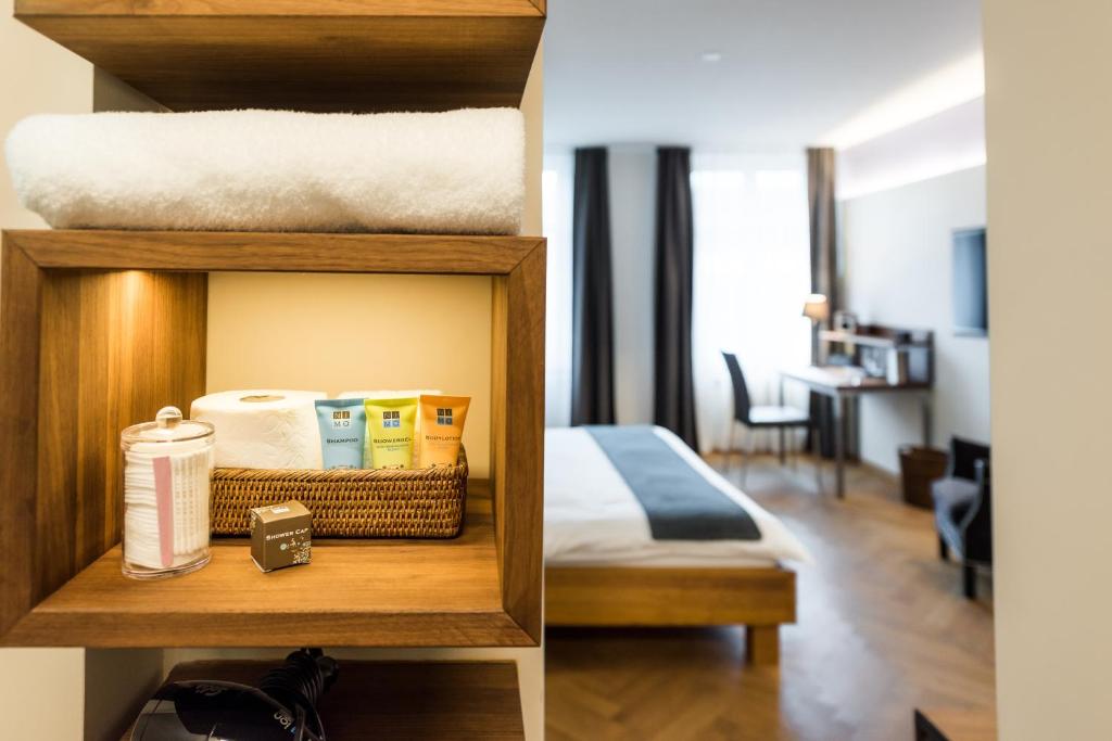 Llit o llits en una habitació de Boutique Hotel NI-MO