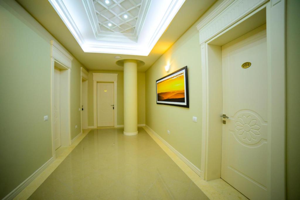 TV a/nebo společenská místnost v ubytování Hotel Vila Imperial