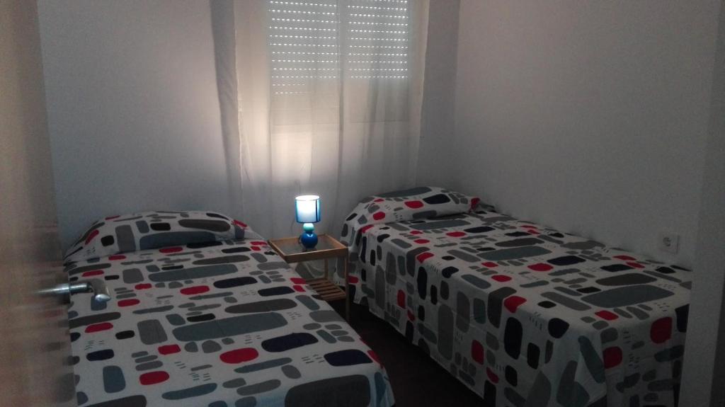 Posteľ alebo postele v izbe v ubytovaní Alojamiento Rural El Abuelo